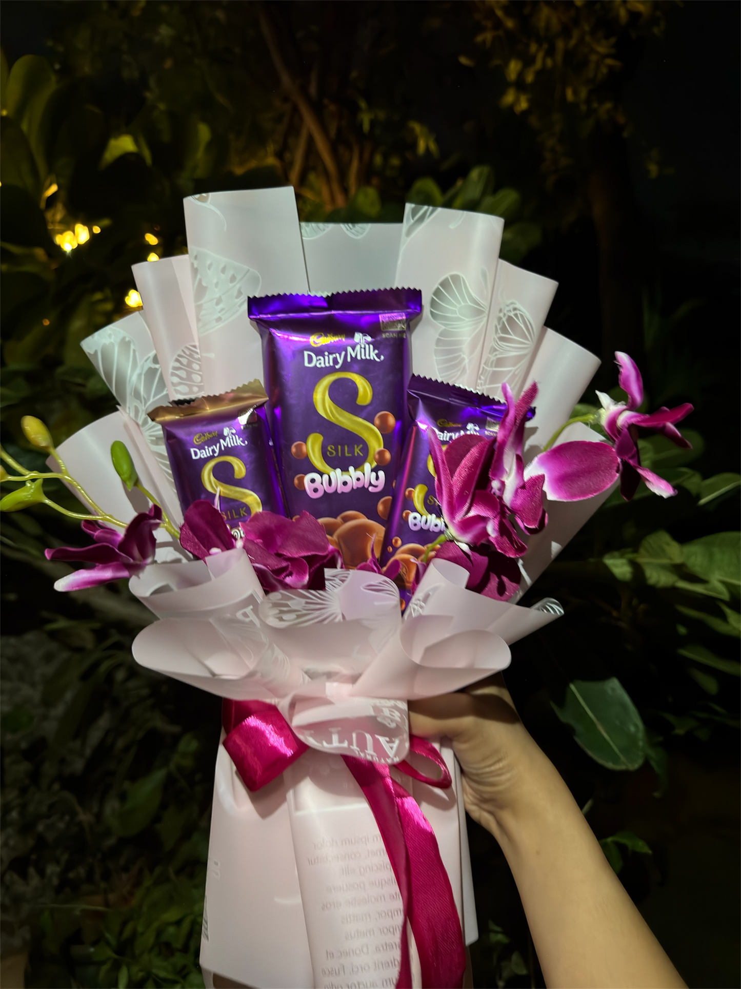 Dairy Milk Silk & Orchid Bouquet – A Touch of Sweet Pink Elegance