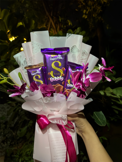 Dairy Milk Silk & Orchid Bouquet – A Touch of Sweet Pink Elegance
