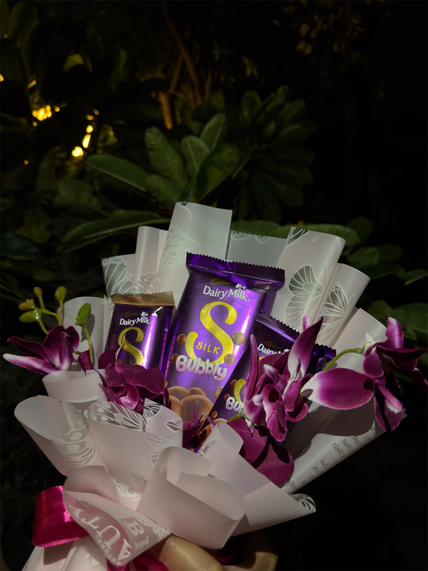 Dairy Milk Silk & Orchid Bouquet – A Touch of Sweet Pink Elegance