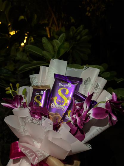 Dairy Milk Silk & Orchid Bouquet – A Touch of Sweet Pink Elegance